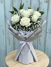 Букет цветов из:  Розы в Сибирском